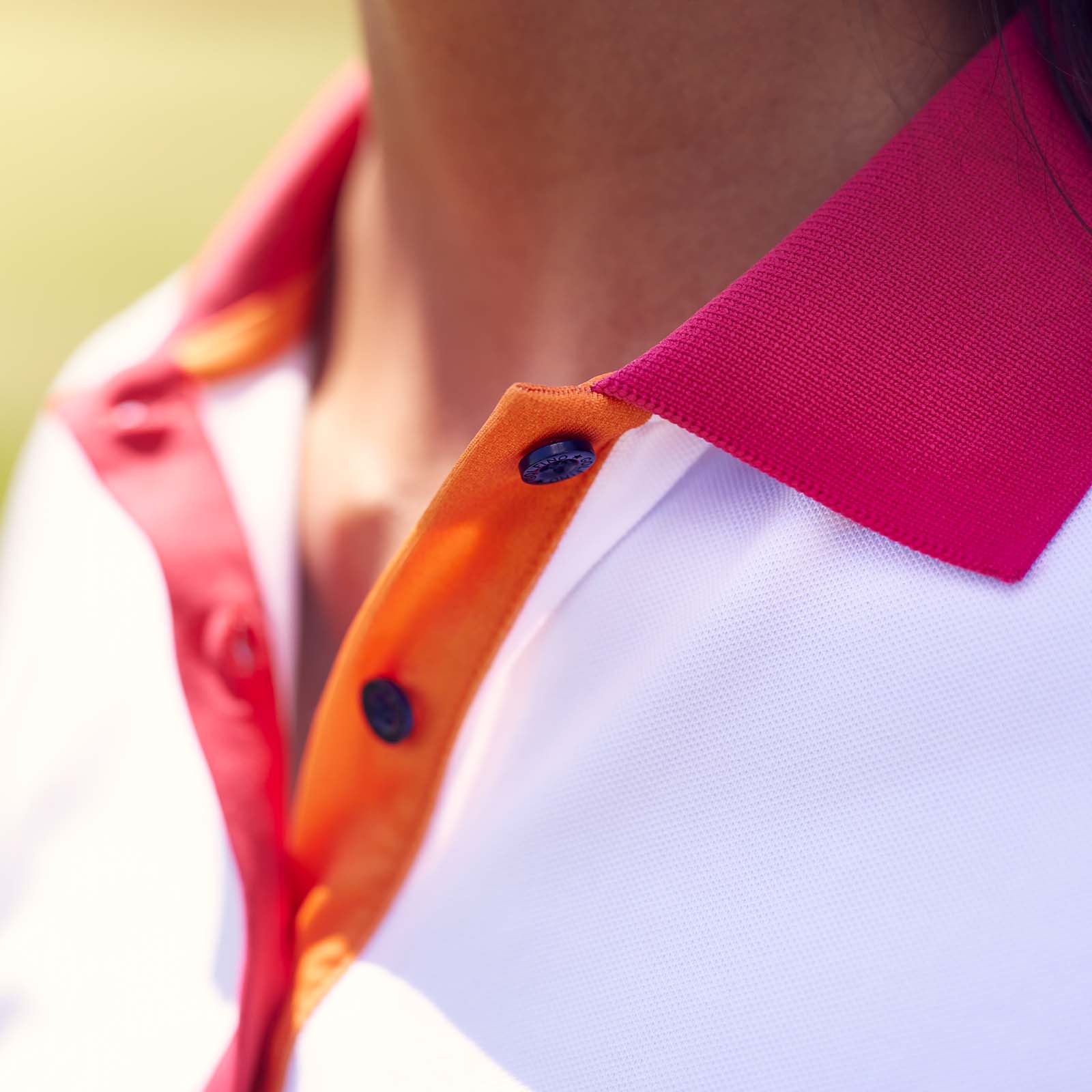 Polo de golf con protección UV para mujer