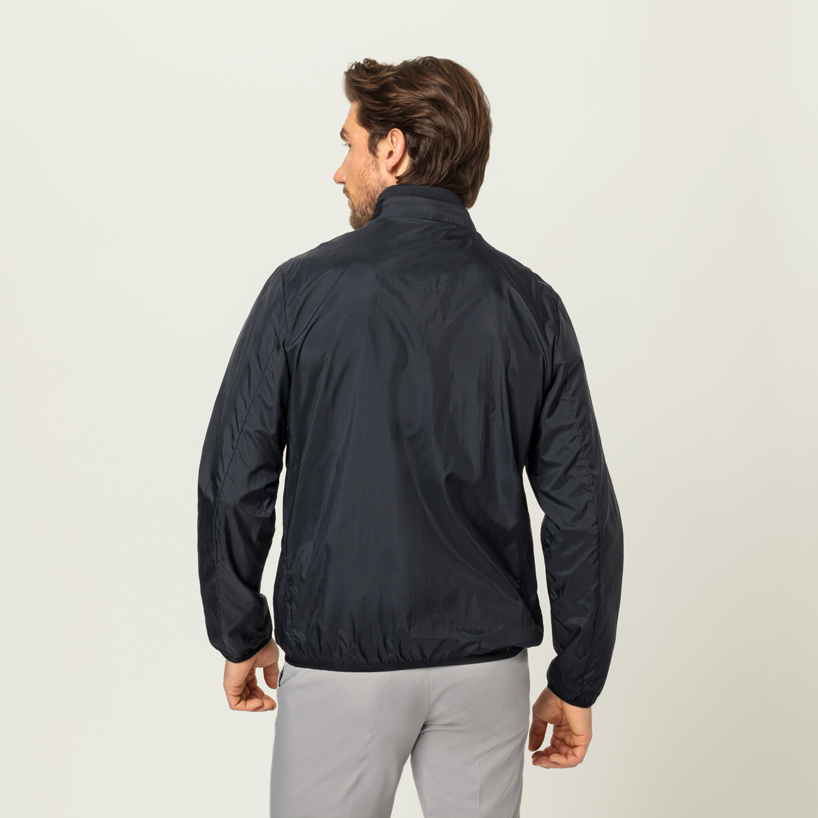 Men's windproof golf jacket made from lightweight microfibre