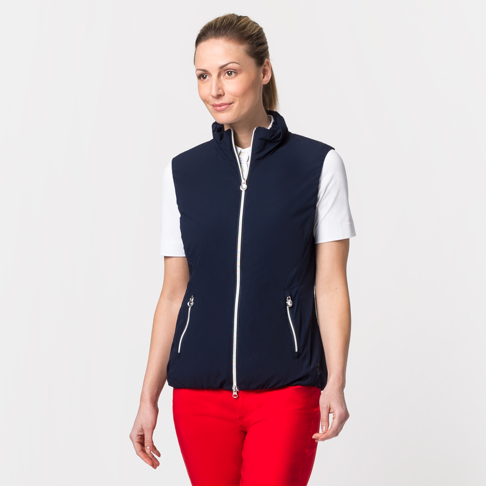 Ladies' golfing gilet made from elastic stretch material with mesh lining
